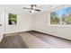 Sunny bedroom features updated floors, neutral paint, and large windows at 96 Middleton Rd., Andrews, SC 29510