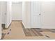Bright hallway featuring new floors, neutral paint, and access to bedrooms at 96 Middleton Rd., Andrews, SC 29510