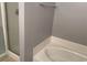 A bathroom with a walk in shower and a tub with light walls at 962 Willow Bend Dr., Myrtle Beach, SC 29579