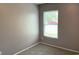 A carpeted bedroom featuring neutral walls and a window providing natural light at 962 Willow Bend Dr., Myrtle Beach, SC 29579