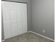 This carpeted bedroom has a double door closet with plenty of storage at 962 Willow Bend Dr., Myrtle Beach, SC 29579