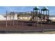 Community playground with swings, slides, and climbing bars on a cushioned surface at 962 Willow Bend Dr., Myrtle Beach, SC 29579