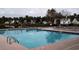 Community pool featuring ample seating and lounge chairs with surrounding landscaping at 962 Willow Bend Dr., Myrtle Beach, SC 29579