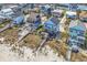View of coastal homes with easy beach access via private walkways at 969 S Waccamaw Dr., Garden City Beach, SC 29576