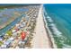 Aerial view of beach homes on stilts with ocean on one side and river on the other at 969 S Waccamaw Dr., Garden City Beach, SC 29576