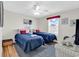 Inviting bedroom with two twin beds, coastal decor, and a bright window with a view at 969 S Waccamaw Dr., Garden City Beach, SC 29576