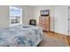 Bright bedroom with beach decor, king bed, and view from window at 969 S Waccamaw Dr., Garden City Beach, SC 29576