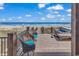 Cozy seating and hot tub on the deck with an ocean view at 969 S Waccamaw Dr., Garden City Beach, SC 29576