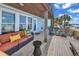 Relaxing outdoor deck with comfortable seating, offering stunning views of the beach at 969 S Waccamaw Dr., Garden City Beach, SC 29576