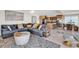 Spacious living area with an open layout that connects the kitchen and dining spaces seamlessly at 969 S Waccamaw Dr., Garden City Beach, SC 29576