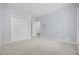 Bedroom with double closet and doorway to bathroom at 9831 Winchester Ct., Murrells Inlet, SC 29576