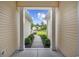 Inviting front porch with walkway and tasteful landscaping leading to the home at 9831 Winchester Ct., Murrells Inlet, SC 29576