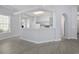Open kitchen with gray cabinets and white countertops, great for entertaining at 9831 Winchester Ct., Murrells Inlet, SC 29576