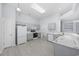 Bright kitchen with gray cabinetry, modern appliances, and wood-look flooring at 9831 Winchester Ct., Murrells Inlet, SC 29576