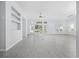 Open-concept living room featuring large windows, hard floors, and neutral walls at 9831 Winchester Ct., Murrells Inlet, SC 29576