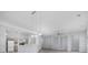 Open-concept living space with gray cabinets and wood-look flooring at 9831 Winchester Ct., Murrells Inlet, SC 29576