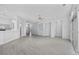 Bright and airy living area with views of the kitchen featuring hard floors and neutral walls at 9831 Winchester Ct., Murrells Inlet, SC 29576