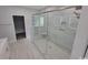Modern bathroom features a spacious glass shower with bench, shelving and stylish tile work at Tbd 7 Duford Rd., Nichols, SC 29581
