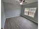 Bedroom features ceiling fan, vinyl floors, and a large window at Tbd 7 Duford Rd., Nichols, SC 29581