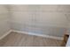 Walk-in closet features built-in shelving and vinyl floors at Tbd 7 Duford Rd., Nichols, SC 29581