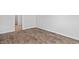 Bedroom with wood-look flooring and view of the hallway at 1004 Sentinel Ct., Little River, SC 29566