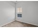 Bright bedroom with wood-look flooring and a window offering natural light at 1004 Sentinel Ct., Little River, SC 29566