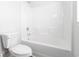 Bathroom with a white tub and toilet at 1013 Kinness Dr., Conway, SC 29527