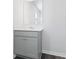 Bathroom featuring a gray vanity with a white countertop and a large mirror at 1013 Kinness Dr., Conway, SC 29527