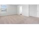 Sun-drenched bedroom featuring neutral carpet and bright window at 1013 Kinness Dr., Conway, SC 29527
