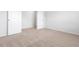 Sun-drenched bedroom featuring neutral carpet and bright doorways at 1013 Kinness Dr., Conway, SC 29527