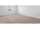 Cozy bedroom offering plush carpeting, neutral walls and natural light from a window at 1013 Kinness Dr., Conway, SC 29527