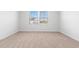 Bright bedroom with neutral carpet and a well-lit double window at 1013 Kinness Dr., Conway, SC 29527