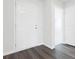 Bright foyer with a white front door, dark wood-look floors, and neutral walls at 1013 Kinness Dr., Conway, SC 29527
