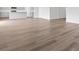 Spacious living area boasting hardwood flooring and a seamless transition to the kitchen space at 1013 Kinness Dr., Conway, SC 29527