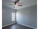 Simple bedroom features neutral paint, wood floors, and ceiling fan at 1031 Snowberry Dr., Longs, SC 29568