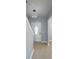 Bright entryway featuring tile floors, an ornate front door and modern pendant lighting at 1031 Snowberry Dr., Longs, SC 29568