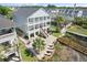 Aerial of home highlighting outdoor living with pool, patio, boardwalk and scenic waterfront views, great for relaxing at 107 Waterway Crossing Ct., Little River, SC 29566