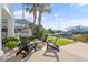 Inviting backyard patio with comfortable seating, perfect for enjoying the waterfront view and beautiful outdoor space at 107 Waterway Crossing Ct., Little River, SC 29566