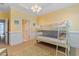 A cheerful bedroom with bunk beds and an adjoining bathroom creates a cozy and functional space at 107 Waterway Crossing Ct., Little River, SC 29566
