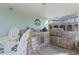 Outdoor kitchen setup with stainless steel grill, sink, and counter space, ideal for entertaining and enjoying outdoor cooking at 107 Waterway Crossing Ct., Little River, SC 29566