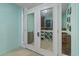 This home features a climate-controlled wine cellar with racks, barrel accents and glass doors at 107 Waterway Crossing Ct., Little River, SC 29566