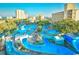 Aerial view of a resort property with waterpark-style pools and winding lazy rivers at 1207 South Ocean Blvd. # 51106, Myrtle Beach, SC 29577