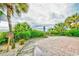 Walkway to the beach with lush greenery and clear skies leading to a beautiful ocean view at 1207 South Ocean Blvd. # 51106, Myrtle Beach, SC 29577