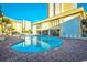 A large in-ground pool with plenty of seating outside a condo building at 1207 South Ocean Blvd. # 51106, Myrtle Beach, SC 29577