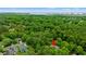 Aerial view featuring a beautiful home surrounded by lush greenery and showing distance to ocean at 1221 Tidewater Dr. # 2811, North Myrtle Beach, SC 29582