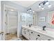 Bright bathroom with double vanity, modern fixtures, and tub and shower combination at 1221 Tidewater Dr. # 2811, North Myrtle Beach, SC 29582