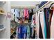 Walk-in closet offering ample storage space with clothing racks and shelves at 1221 Tidewater Dr. # 2811, North Myrtle Beach, SC 29582