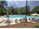 Enjoy the outdoors at this large community pool and sunbathing area with lounge chairs and tables at 1221 Tidewater Dr. # 2811, North Myrtle Beach, SC 29582