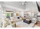 Spacious living room with two couches, a ceiling fan, hardwood floors, and an area rug at 1221 Tidewater Dr. # 2811, North Myrtle Beach, SC 29582