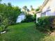 Spacious backyard with a storage shed, bordered by lush greenery for privacy and outdoor activities at 131 Goodale Dr., Longs, SC 29568